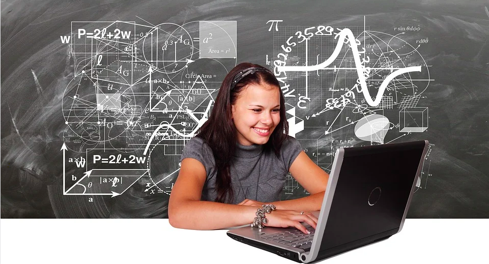 EdTech - School girl studying on laptop online